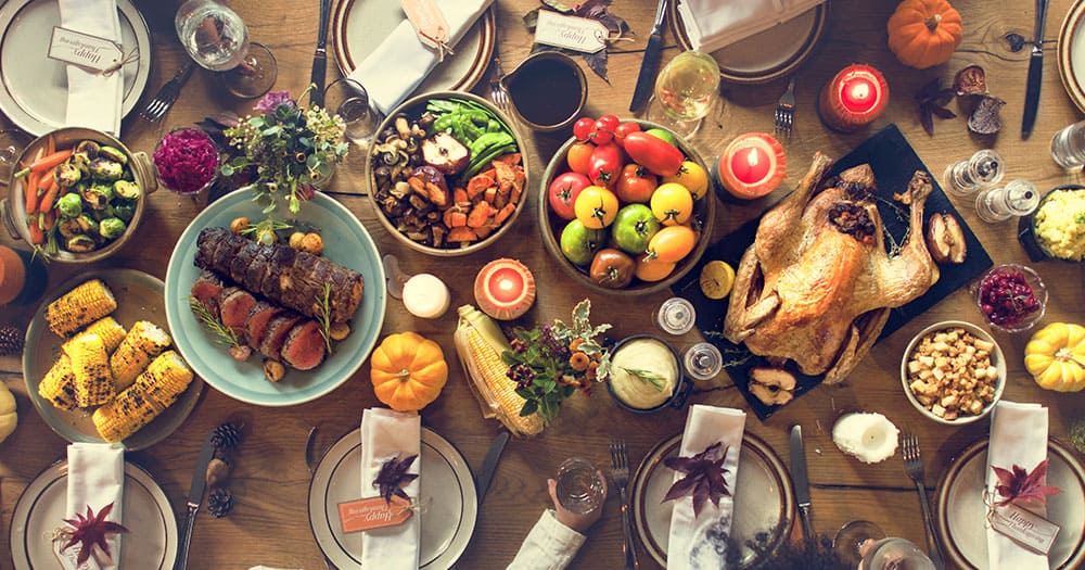 Thanksgiving dinner table with food