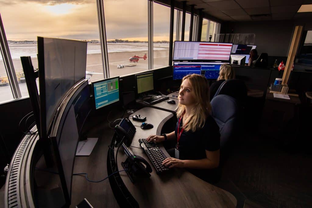 A woman working at the operational control center