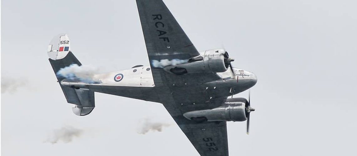 RCAF 552 flying against a clear sky