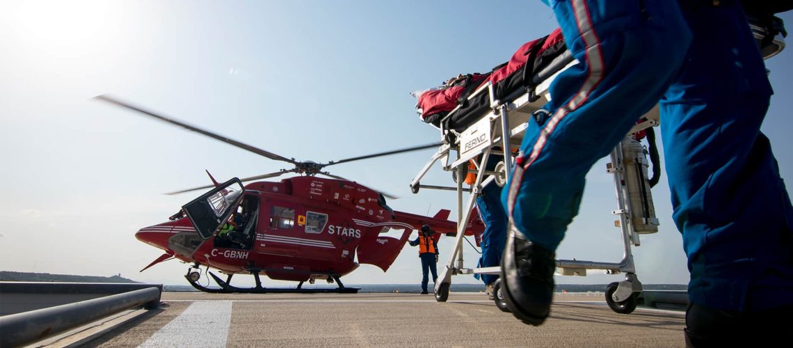 Air Medical Services offloading patient from STARS air ambulance H145 helicopter
