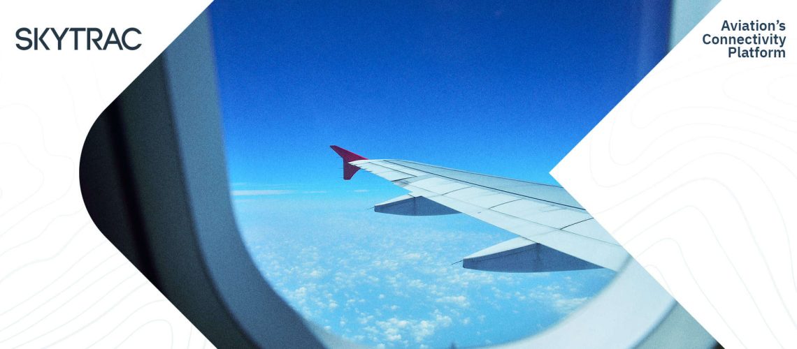 The wing of an airplane as seen through the cabin window