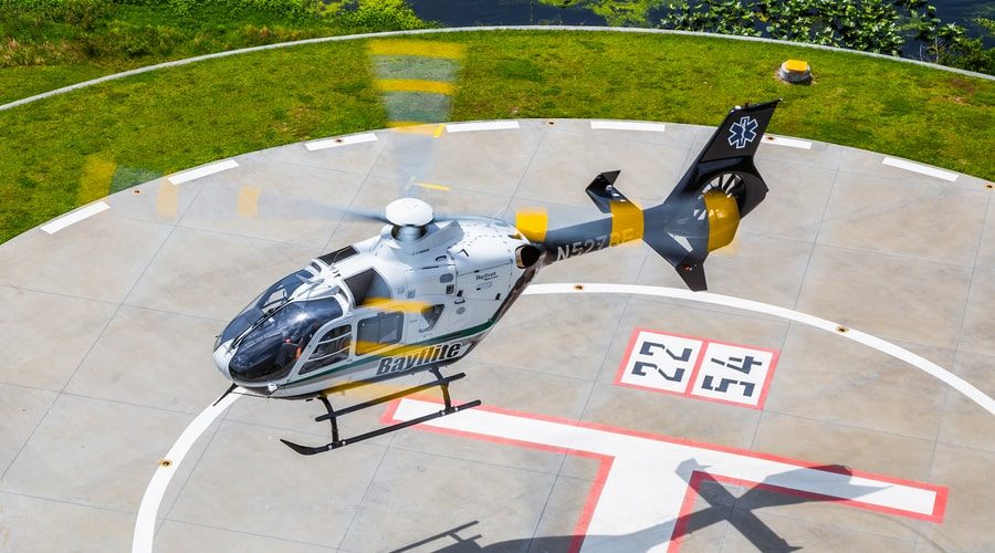 ems-helicopter-hovering-on-helipad ems-helicopter-hovering-on-helipad