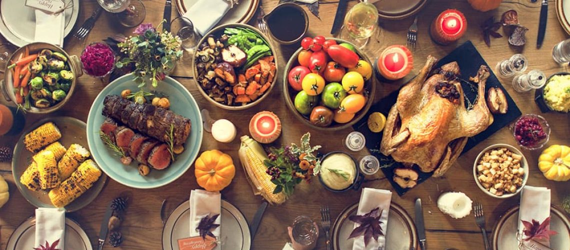 Thanksgiving dinner table with food